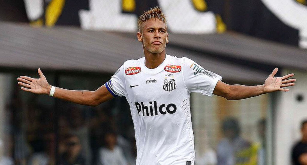 Neymar scores and celebrates goal for Santos FC